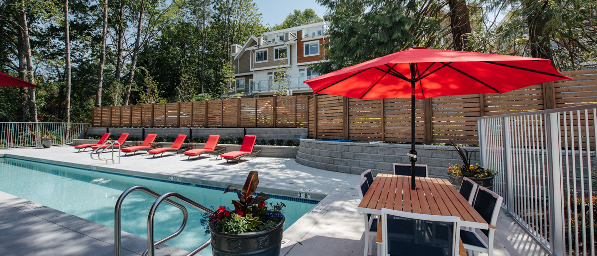 At the poolside in South Surrey Townhomes South Ridge Club